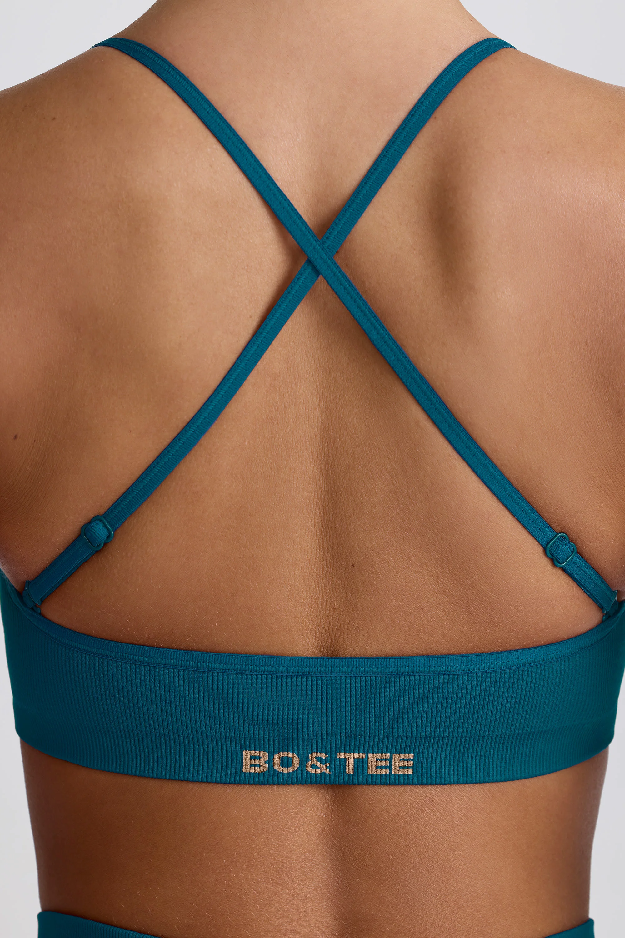 Super Sculpt Seamless Cross-Back Sports Bra in Teal - Image 5
